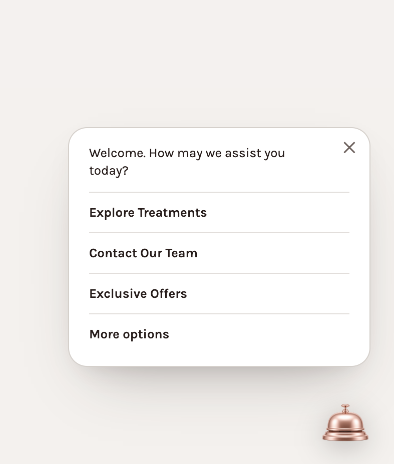 Compact light concierge launcher card with a welcome message, three menu links and a More options link, beside a small service bell.